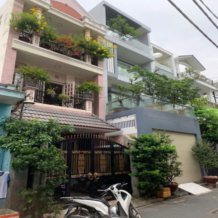 15.8-15.6 BILLION VND,  Beautiful 4-Story House on Nguyen The Truyen St., 5.2x23m,  Private Indoor Parking.